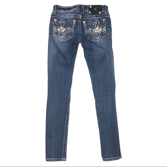 skinny jeans with bling on back pockets